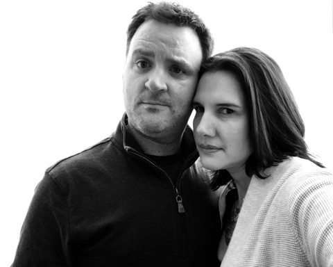 Patrick and Amy Kirkland, heads together, in a black-and-white photo.