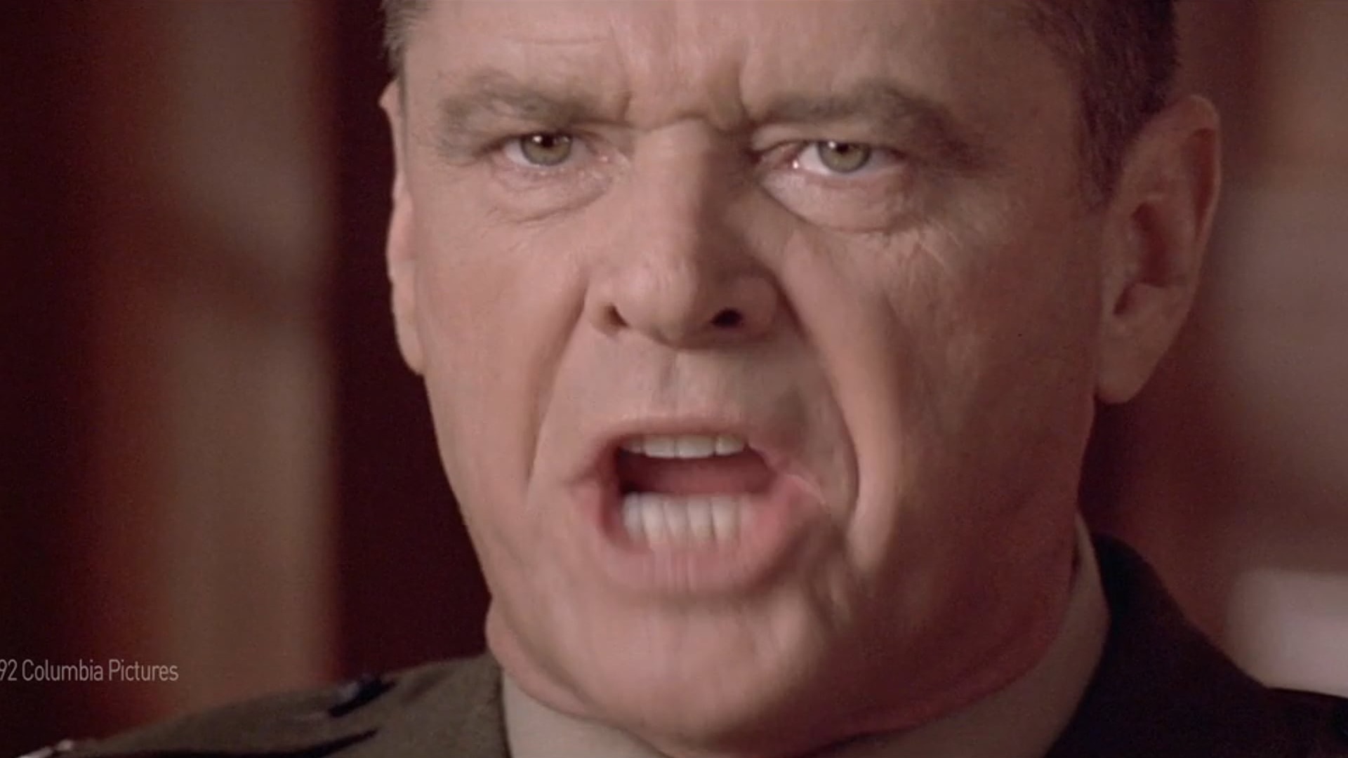 Frame from Anthem: a close-up of an actor mid-line in a film scene.